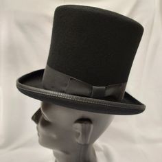 Broadway Quality, Made In Usa, 100% Wool Squire 6.25" Top Hat. Color: Black American / Nearest 1/8 Inch / Metric Cm / Size Code 6 3/4 21 1/8 54 Small 6 7/8 21 1/2 55 Small / Child L Broadway Quality Made In Usa By Hxc Hatcrafters Inc. These Hats Are Of High Quality And No Longer Manufactured So The Sizes And Quantity Available Are Finite. We Also Cannot Accept Lower Bids On These Hats As They Are Already At Reduced Prices. Black Formal Short Brim Hat, Formal Black Short Brim Hat, Classic Black Felt Hat With High Crown, Classic Black High Crown Felt Hat, Curved Brim Hats For Winter Derby, Curved Brim Derby Hat For Winter, Winter Derby Hats With Curved Brim, Black Top Hat With Short Brim For Formal Occasions, Classic Black Winter Hat