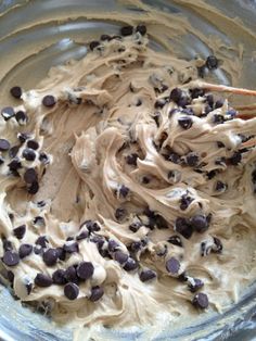 a bowl filled with chocolate chips and cream