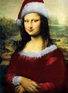 a woman wearing a santa claus hat with her arms crossed in front of her chest