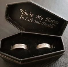 two wedding rings in a black box with the words you're my heaven