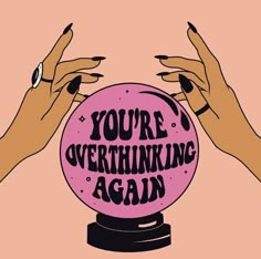 two hands holding a pink ball that says you're overthinking again