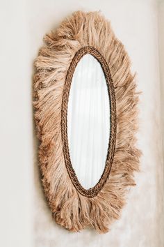 This oval mirror has grass fringe around it, giving it a bohemian appearance. It will complement your plain wall well. Seagrass Furniture, Beautiful Furniture, Round Mirrors, Mirror Wall, Decorative Pieces, Planting Flowers, Mural, Mirror