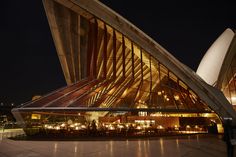 A view of the #SydneyOperaHouse #Bennelong Restaurant #tomdixon #MeltPendant #copperlighting #SydneyHarbour Opera House, At Night