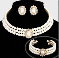 Gorgeous Rhinestone Trimmed Pearl Necklace Three-Piece Necklace Set. Perfect for bride, bridal party & any special occasion. Description: Necklace Size: 11 + 3 L Decor Size: 1 L Bracelet Size: 1 H / Cuff Earrings Size: 1 L This item is non-returnable In stock ready to ship!!!!!! Vintage Pearl Necklace Set, Luxury Festive Jewelry Sets With Pearl Drop, Pearl And Diamond Necklace Set, Luxury Festive Temple Necklace With Pearl Drop, Royal Accessories Necklace, Pearl Choker Wedding, Formal Necklace, Clear Necklace, Clear Earrings