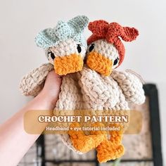 two crocheted stuffed chickens are held in their hands