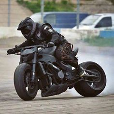 a man riding on the back of a motorcycle