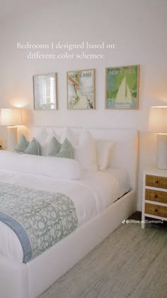 a white bed sitting in a bedroom next to two lamps