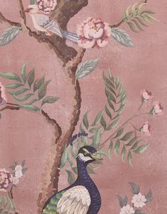 a bird sitting on top of a tree next to flowers