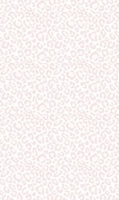 an animal print wallpaper pattern in pink and white