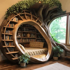 a living room with a tree shaped book shelf and couch in the center, surrounded by bookshelves