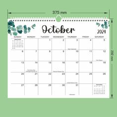 a calendar with the word october in black and green watercolors, on a light green background