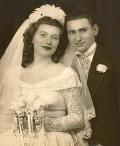 an old black and white photo of a bride and groom