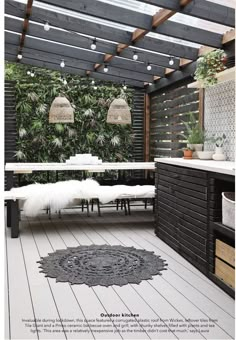 an outdoor dining area with benches and potted plants