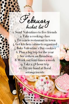 a table topped with lots of pink and white desserts next to a sign that says february bucket list