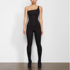 Both A Statement And An Essential. The One Shoulder Onesie Gives You All-Day Support And The Snatched Waist You've Been Searching For. This Pull-On Style Is Lined With Power Mesh For Added Support And Easy Wearing. Sold Out Online!! Mock Neck Bodysuit, Black Off Shoulder, Long Sleeve Onesie, Styling Tips, Black Sleeveless, Black Bodysuit, Catsuit, Personal Stylist, Mock Neck