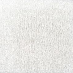 a white rug that is very soft and fluffy