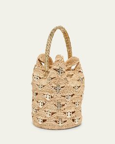 Rabanne "Sac a Main" bucket bag in raffia and disclink brass    Chain top handle     Shoulder strap    Can be worn as a top handle or shoulder bag     Drawstring closure     Approx. 9.8"H x 9.4"W x 5.9"D    Imported Raffia Bucket Bag, Embellished Bags, Chain Top, Walk In Wardrobe, Chain Mail, Paco Rabanne, Crochet Handbags, Cosmetic Pouch, Brass Chain