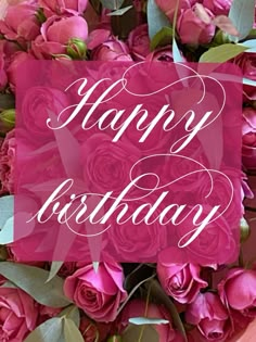 a bouquet of pink roses with the words happy birthday