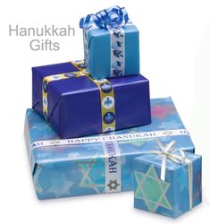 three wrapped presents stacked on top of each other with the words hanukkah gifts