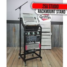 a recording equipment stand with microphone and sound board