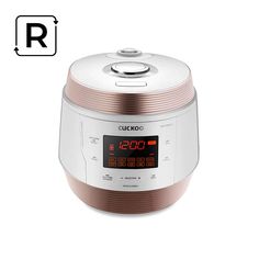 an electric rice cooker is shown with the timer on it's side and its time displayed