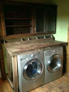 a washer and dryer in a small room