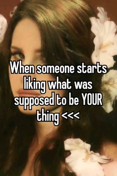 a woman with flowers in her hair and the words when someone starts liking what was supposed to