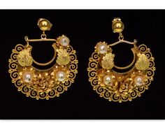 Amazing Victorian 2-tone gold Etruscan revival dangle earring C.1860. The earrings designed as crescents with elaborate filigree work. They are embellished with 3-D flowers, carved yellow gold leaves, and wired pearls. There is a lot of movement on the crescent dangles. The earrings are 37 mm tall, 30 mm wide. They are tested 14K gold, the butterfly nuts stamped 14K.. Total weight is 9 grams. Excellent antique condition commensurate with age. Historical Yellow Gold Drop Earrings, Yellow Gold Historical Drop Earrings, Yellow Gold Drop Earrings With Historical Design, Antique Gold Earrings With Historical Design, Antique Jewelry With Historical Design Drop Earrings, Antique Jewelry Drop Earrings With Historical Design, Antique Historical Drop Earrings, Antique Drop Earrings With Historical Design, Victorian Gold Plug Earrings