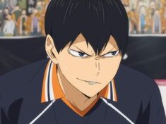 an anime character with black hair and blue eyes looks at the camera while wearing an orange shirt