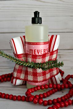 a red and white christmas decoration with soap