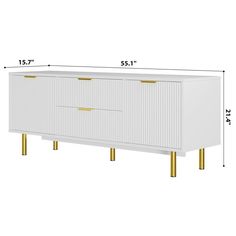 a white and gold cabinet with two brass legs on the bottom, measurements for each drawer