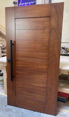 a close up of a wooden door in a building