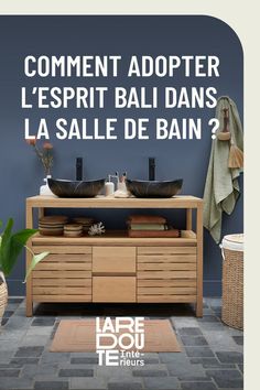 a bathroom with two sinks and a towel on the wall next to it is an advertisement for jabrelle de bain