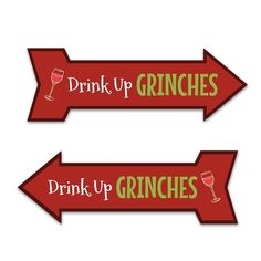 two red signs that say drink up grinies and drink up grinies