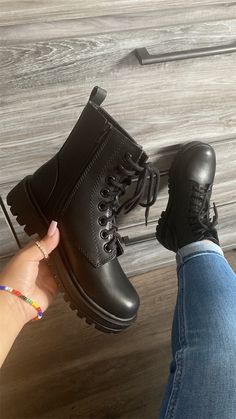 Put your best foot forward in this stylish Black Combat Boot! Boasting a sleek and comfy lace-up design, and a simple side zipper for effortless on/off, you'll be sure to stand out from the crowd. The perfect combination of style and convenience - what's not to love?! Size Measurements for all products are made on a size 6. Please note that measurements may vary by size. True to Size Approx 1” Heel Product Details Closed Round Toe Side Zipper Closure PU Leather Chunky Heel Light Weight Lightly P Combat Boot Heels, Combat Boots Aesthetic, Boot Heels Outfit, Cute Combat Boots, Combat Boots Heels, Long Black Boots, Lace Up Boots Women, Classy Shoes, Womens Combat Boots