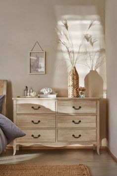 a bedroom scene with focus on the dresser