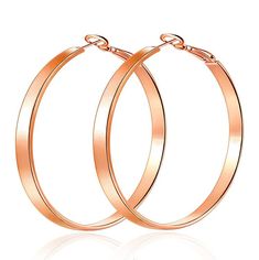 PRICES MAY VARY. Fashion ladies hoop earrings size: Length- Approx 2 inch(50mm), Width- Approx 2 inch(50mm), Light weight: 0.28 0Z; Flattened Hoop Earring: The rose gold hoop earrings are natural and perfect; Super light weight. The clasp is easy to open and close. Very convenient and comfortable to wear. These big hoops earrings are high-grade environmental jewelry. Durable and bright. Lead free and nickel free. Hypoallergenic. Safe for sensitive ears. MESMERIZING DESIGN - This design is Sleek Big Hoops Earrings, Rose Gold Hoop Earrings, Hoops Earrings, Sensitive Ears, Gold Hoop, Gold Hoop Earrings, Jewelry Bags, High Quality Jewelry, Earrings For Women