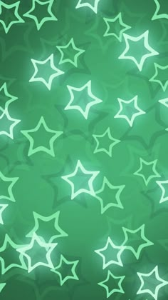 an abstract green background with white stars