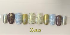 Short coffin, sky blue, silver, gold, columns, lightning, clouds, Jupiter symbol Pjo Inspired Nails, Percy Jackson Nail Art, Greek Style Acrylic Nails, Greek Mythology Nails, Greek Nail Art Goddesses, Percy Jackson Nails, Jupiter Symbol, Lightning Clouds, Short Coffin