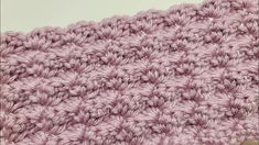 the crochet pattern is shown in shades of pink