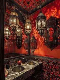 an ornate bathroom with red walls and lights