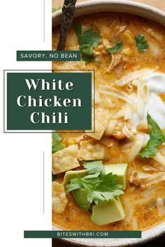 white chicken chili with avocado, sour cream and cilantro in a bowl