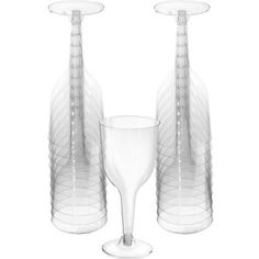 three clear vases and one empty wine glass are shown with the number 20 on it