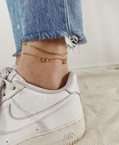 ✨ Keep it cool this summer with our sleek star, moon, heart anklet in gold-filled! Perfect for rocking solo or stacking with your faves. Ready to shine wherever the season takes you! 💛 All anklets come in 10 inches, if you would like it sized smaller add your measurment in the notes section of your order. Keep in mind when requesting a custom size - you do not want your anklet too tight, add half an inch for a looser fit. ∙ C H A I N ∙ D E T A I L S ∙ - 18k Gold Filled Chain- 18k Gold Filled Findings- 10 inches, read above for sizing ∙ G O L D ∙ F I L L E D ∙ Gold-filled components contain 100+ times more real gold than gold-plated components and are both durable and tarnish resistant. It is more affordable and accessible than solid gold but higher quality than gold plated. Gold Anklets For Everyday Summer Wear, Trendy Gold Anklets For Festivals, Trendy Summer Anklets For Everyday Use, Trendy Everyday Anklets For Summer, Trendy Everyday Summer Anklets, Trendy Star Charm Jewelry For Summer, Trendy Summer Jewelry With Star Charm, Gold Anklets With Star Charm For Gift, Gold Anklet With Star Charm As Gift