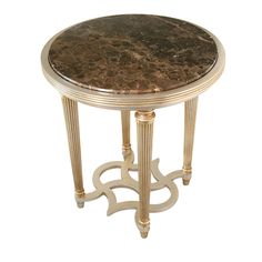 a marble topped table with gold trimmings on the top and bottom, against a white background