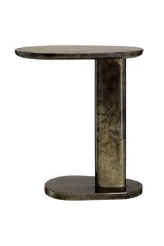 a round table with a metal base on the top and an oval shelf underneath it