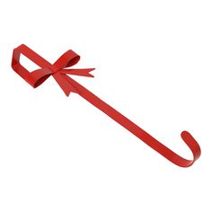 a red ribbon with a bow on it is hanging from a hook in the air