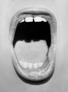 an open mouth with the words'notrious'written on it, in black and white