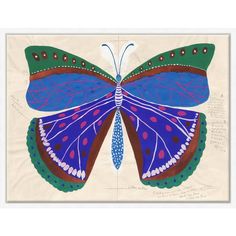 a blue and green butterfly with red spots on it's wings, sitting on top of