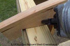 a close up of a piece of wood being used to build a bench